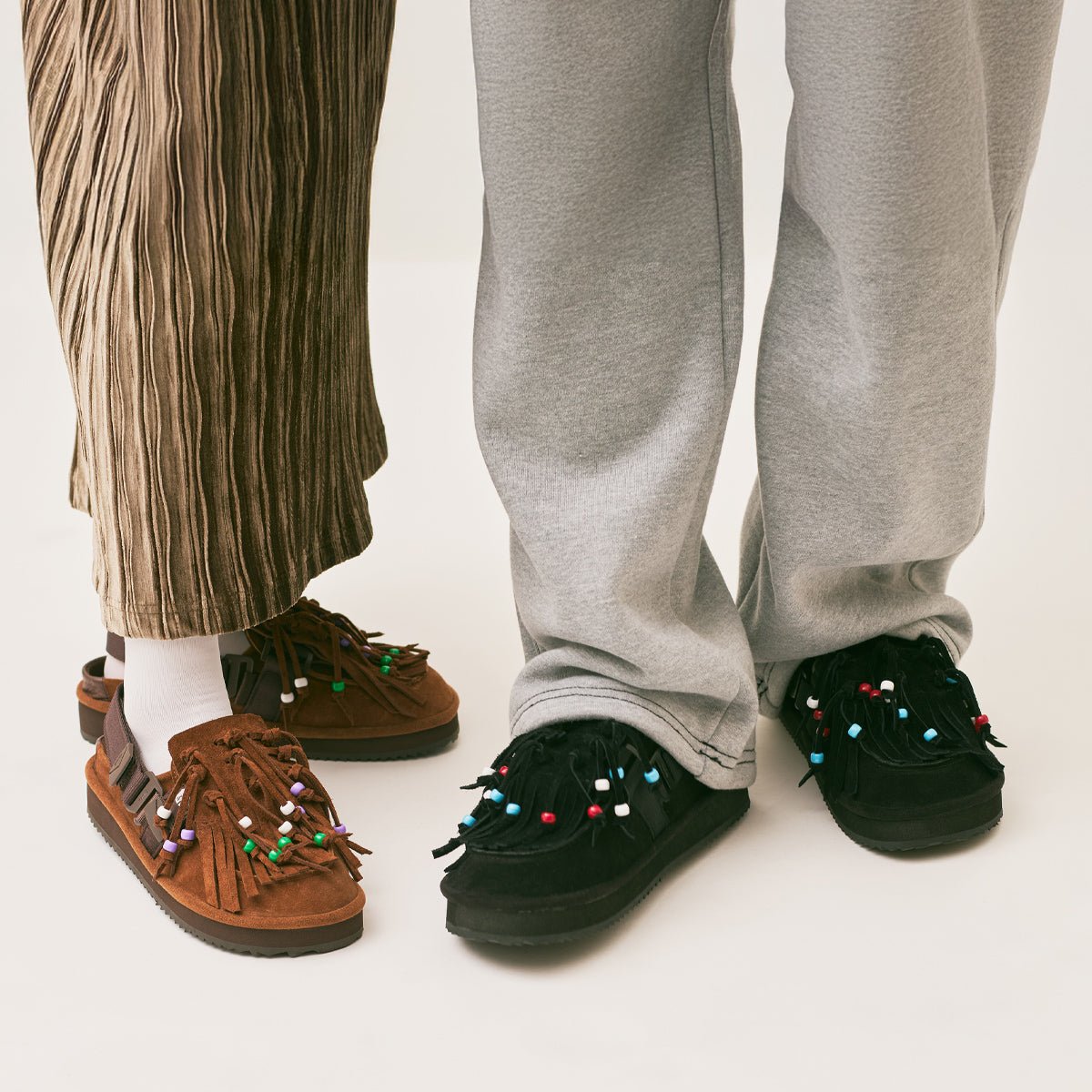 SHAKA キルトタッセル付きミュールサンダルMOC MULE TASSEL COWHAIR