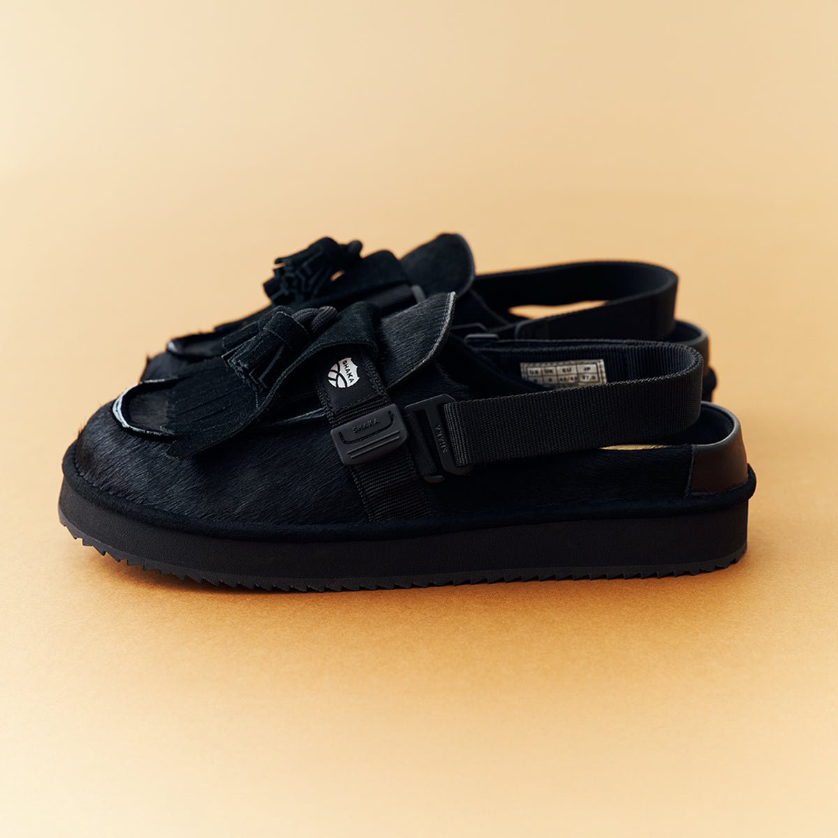 【予約/9月下旬入荷予定】 SHAKA キルトタッセル付きミュールサンダルMOC MULE TASSEL COWHAIR [メンズ/レディース][2026 秋冬] SK-339 - SHAKA(シャカ)公式オンラインストア